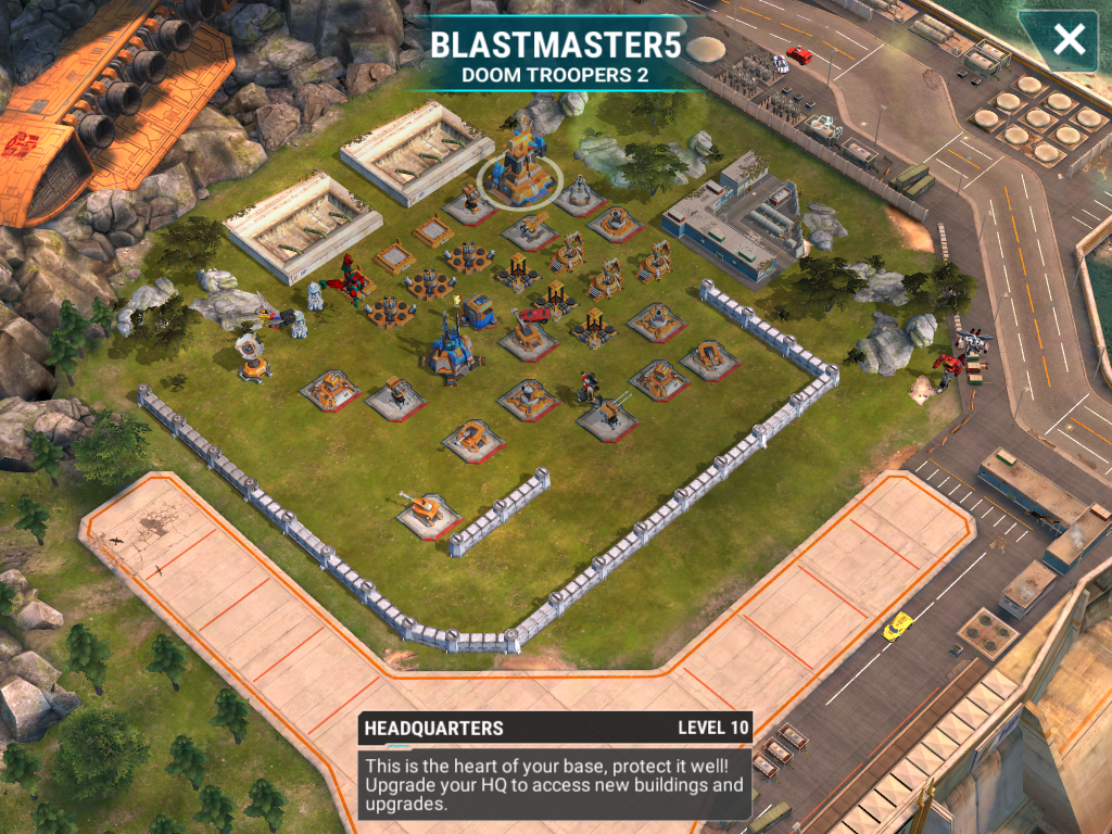 We continue on to a level 10 base. This base features a prominent AOE spot right at the conjoining of a beam, shock tower, and mortar. Otherwise, the base has relatively well spread out big guns. Sniping attacks will help you with the spread out guns.